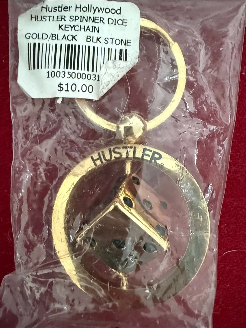 Hustler Hollywood Gold Keychain with Black Accent Dice Spinner